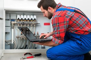 Technician servicing the underfloor heating